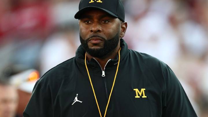 Fired Michigan coach Sherrone Moore in custody; no decision on charges