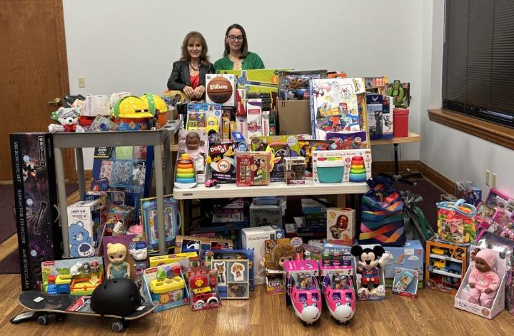 Toy drive for Mutual Ground stirs memories for Aurora leader