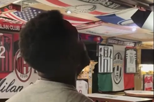 Awkward moment Darren Bent caught admiring his own shirt in New York bar