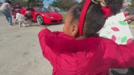 Forget the sleigh: Ferrari Club of Louisiana delivers Christmas gifts to children