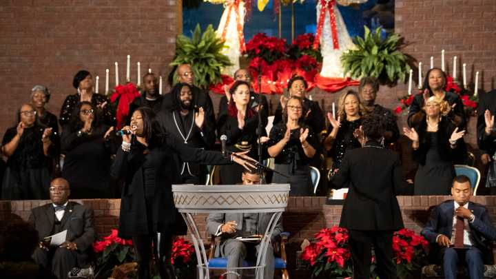 Leaders urge action at mass meeting, 70 years after bus boycott