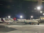 Man arrested after police say he tried to open plane door on flight from Boston