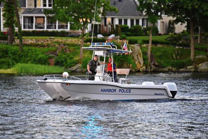 Person missing after being seen clinging to side of boat in Merrimack River