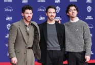 The Jonas Brothers leave handprints, footprints at iconic Hollywood theater