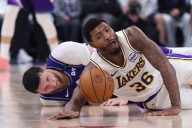 Deadspin | Lakers G Marcus Smart (back) hopes to play vs. Spurs