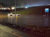 Storms bring heavy rain to the Pacific Northwest, snow and freezing rain to the Upper Midwest
