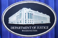 Justice Department asks appeals court to block judge's contempt inquiry in mass deportation case