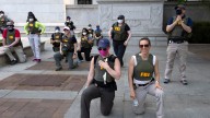 FBI agents sue after being fired for kneeling during racial justice protest
