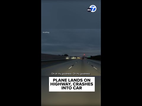 Plane crash lands on highway, hits car