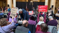 'Failure of transparency' | Hoosiers protest redistricting outside House chambers