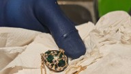 Police recover a James Bond-inspired Fabergé pendant from the bowels of a man accused of eating it