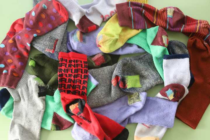 The Personal Satisfaction of Darning a Pile of Holey Socks