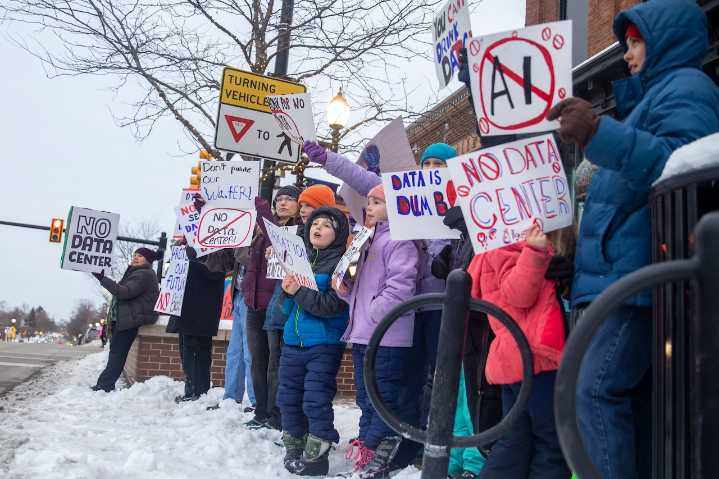 Protesters rally against DTE’s attempt to fast-track OpenAI, Oracle data center