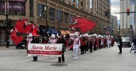 Marching Saints return home from Chicago tour, Thanksgiving Day Parade