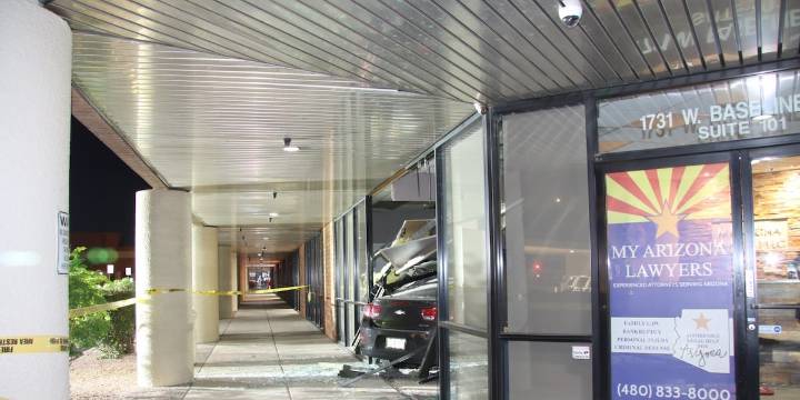 Police: Dad lets 13-year-old drive, car plows into Mesa law office
