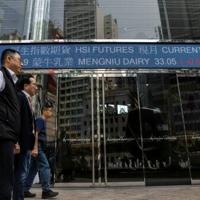 World stocks mostly slide, consolidating Fed