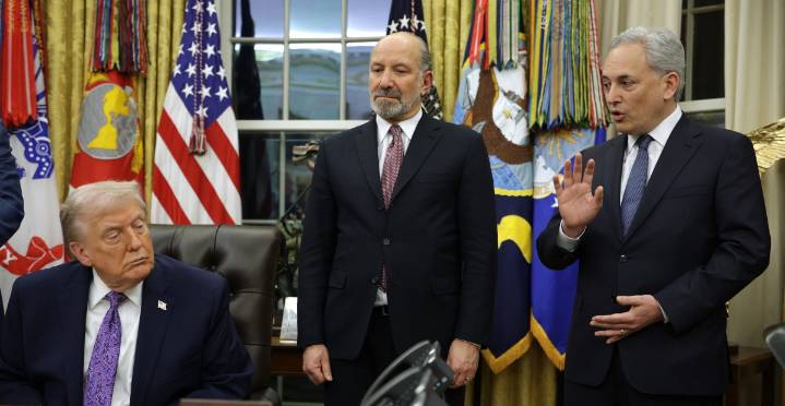 Trump signs AI executive order pushing to ban state laws