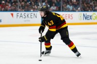 Canucks trade former Norris Trophy winner Quinn Hughes to Wild