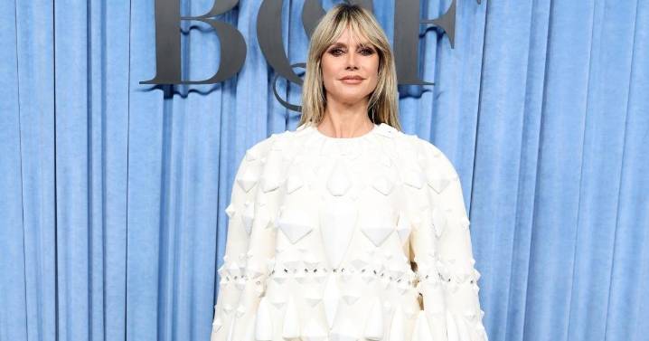 Heidi Klum Proves Sheer Tights Can Handle the Tiniest Miniskirts