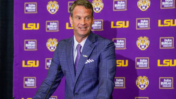 LSU coach Lane Kiffin announces that defensive coordinator Blake Baker will remain with the Tigers