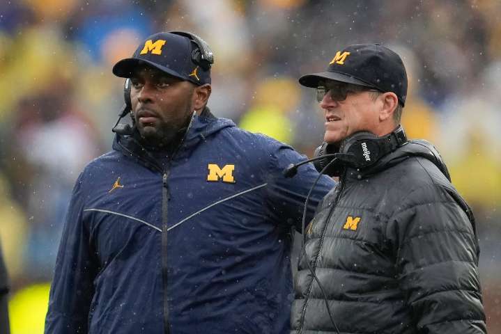 Jim Harbaugh has few words when asked about Sherrone Moore’s firing, arrest