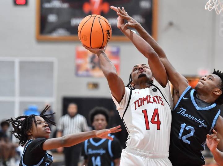 Basketball: Unknown Jason Moore steps up for East Aurora