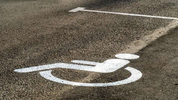 City paints disabled bay around parked car, tickets owner on vacation