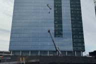 Window-washing basket malfunctions, 2 workers rescued midair from Fairfax County high