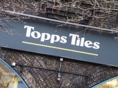 Topps Tiles buys Fired Earth brand from administration as sales growth slows