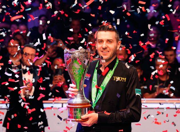 Mark Selby holds off Judd Trump fightback to win third UK Championship