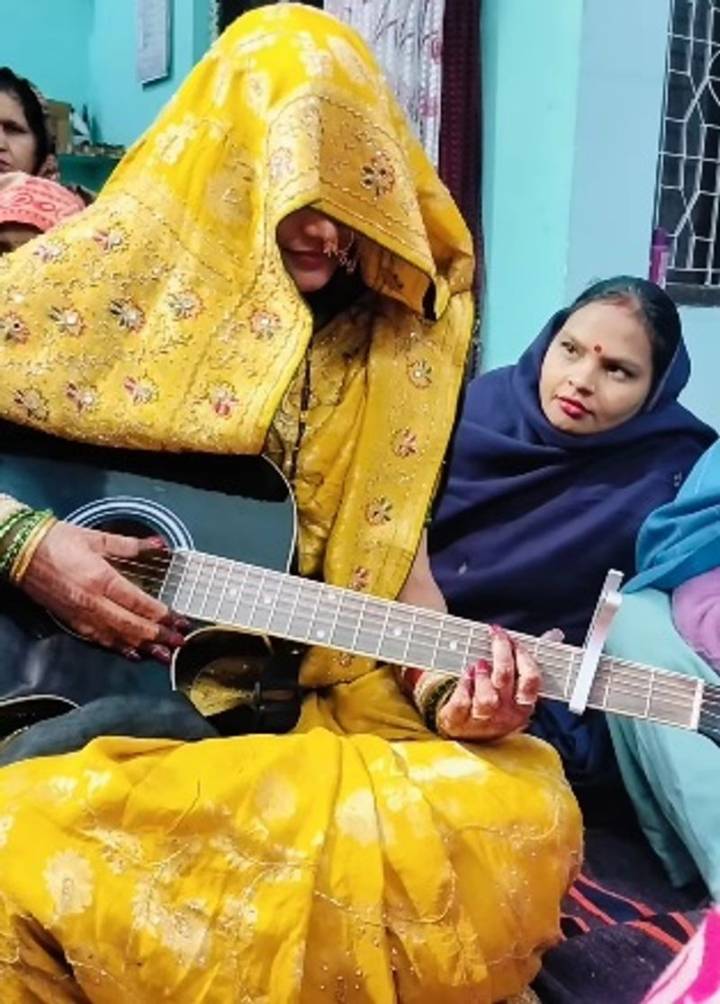 'Veiled' talent: Bride strums SRK classic on guitar, but sparks 'ghunghat' debate