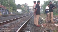Grinding stone found on railway track; coup behind?