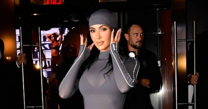 Kim Kardashian in Spandex Pants & Coat Will Surprise You