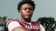Watch Caravel stars sign to play football at Miami, James Madison