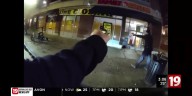 BODYCAM: Cleveland police officer shoots at suspect armed with pickaxe in Ohio City
