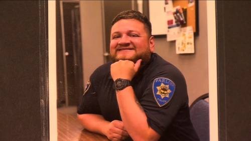 Community remembers fallen Parlier police officer at candlelight vigil