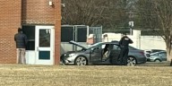 Car crashes on middle school property in Henrico