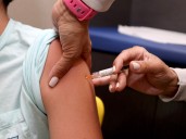 CDC's vaccine advisers meet to question long