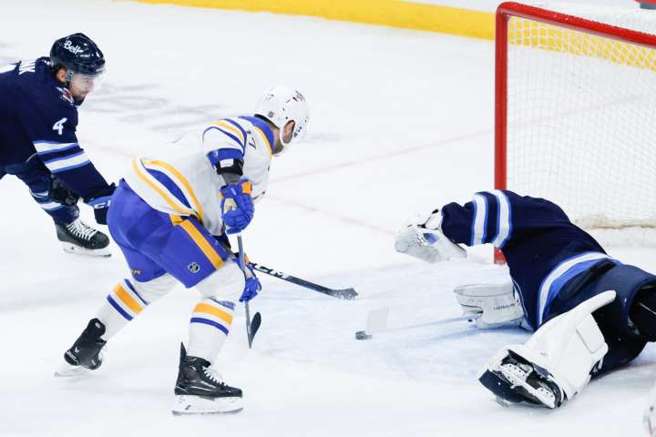 Eric Comrie (34 saves) guides Jets to win over Sabres - The Rink Live | Coverage of youth, junior, high school and college hockey