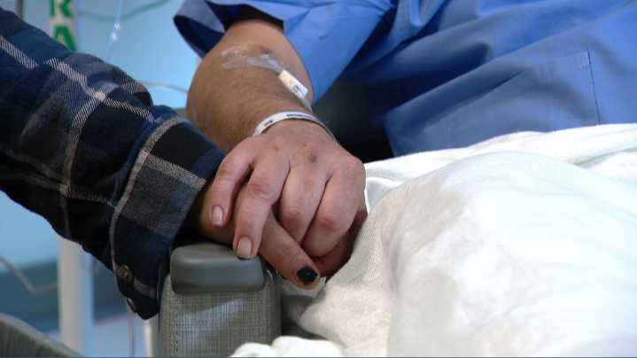 Colorado man pushes fiancée out of harm's way before car crash breaks his legs