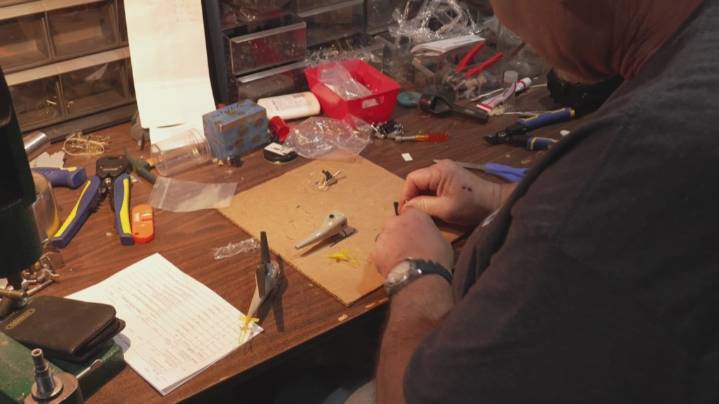 Small business owner says 1,000 packages stuck at post office