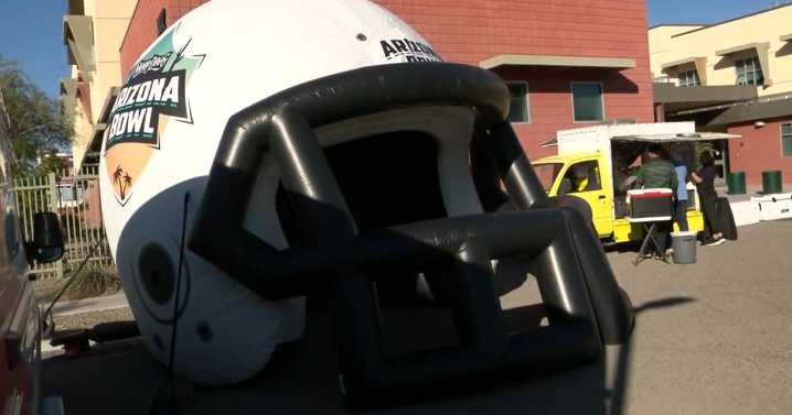 Tucson sees giant Snoop Dogg bowl helmet as event aids local causes