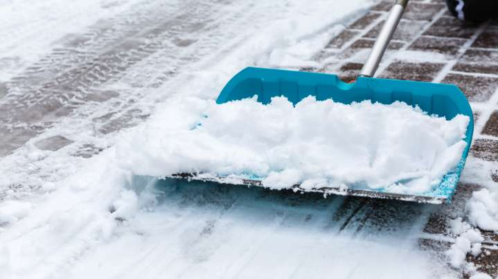 The Forgotten Kitchen Liquid That Makes Shoveling Snow So Much Easier