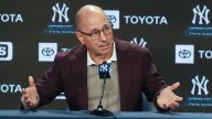 Yankees general manager Brian Cashman says he hasn't been told to reduce the payroll