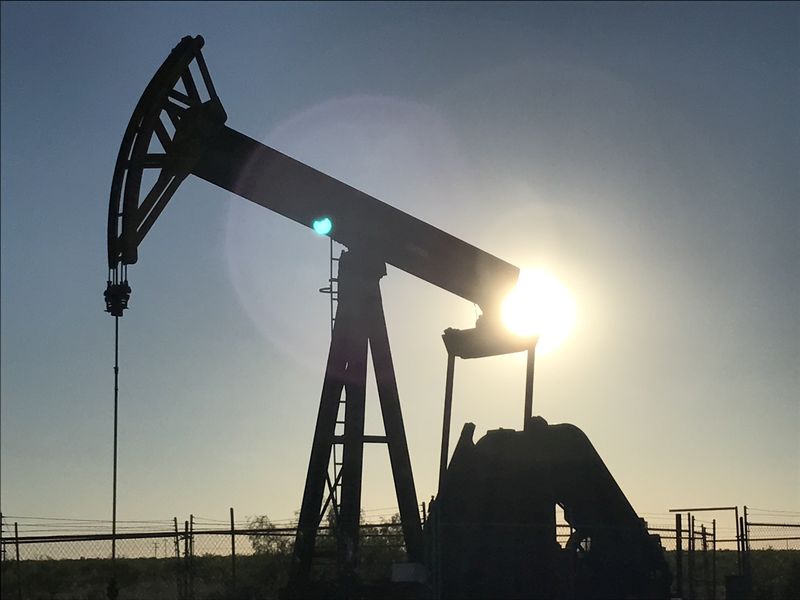 Oil prices head for 2% weekly gain as Fed hopes boost market, Venezuela tensions loom
