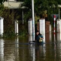 Flooding kills two as Vietnam hit by dozens of landslides