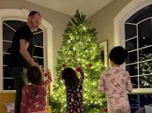 My husband handles 100% of the holiday magic, and I buy the gifts. He has the much harder job.