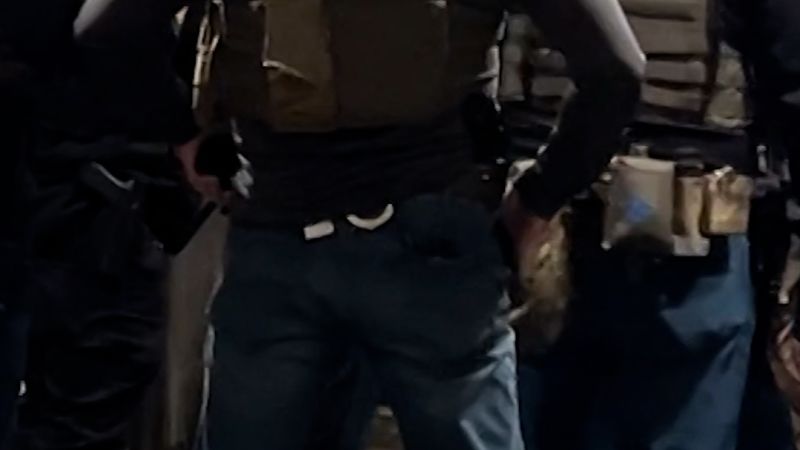 Person of interest in custody in Brown University shooting that left two students dead