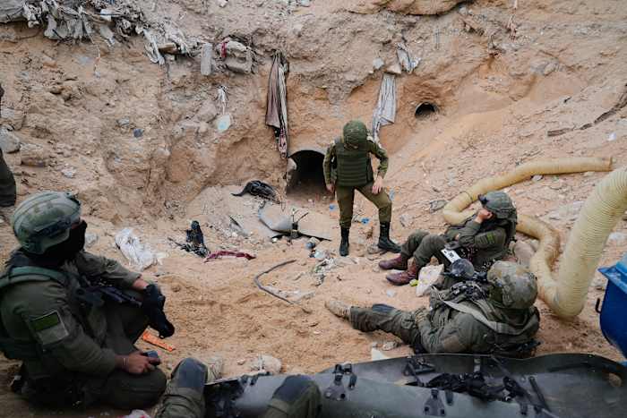 Israeli army takes journalists into a tunnel in a Gaza city it seized and largely flattened