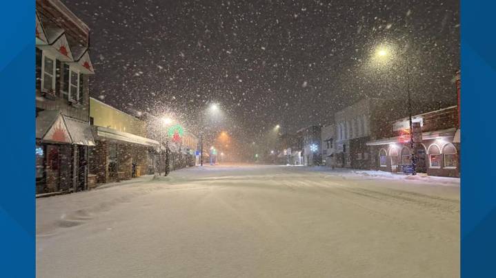 Lake effect snow blankets lakeshore counties as residents and anglers brave severe conditions